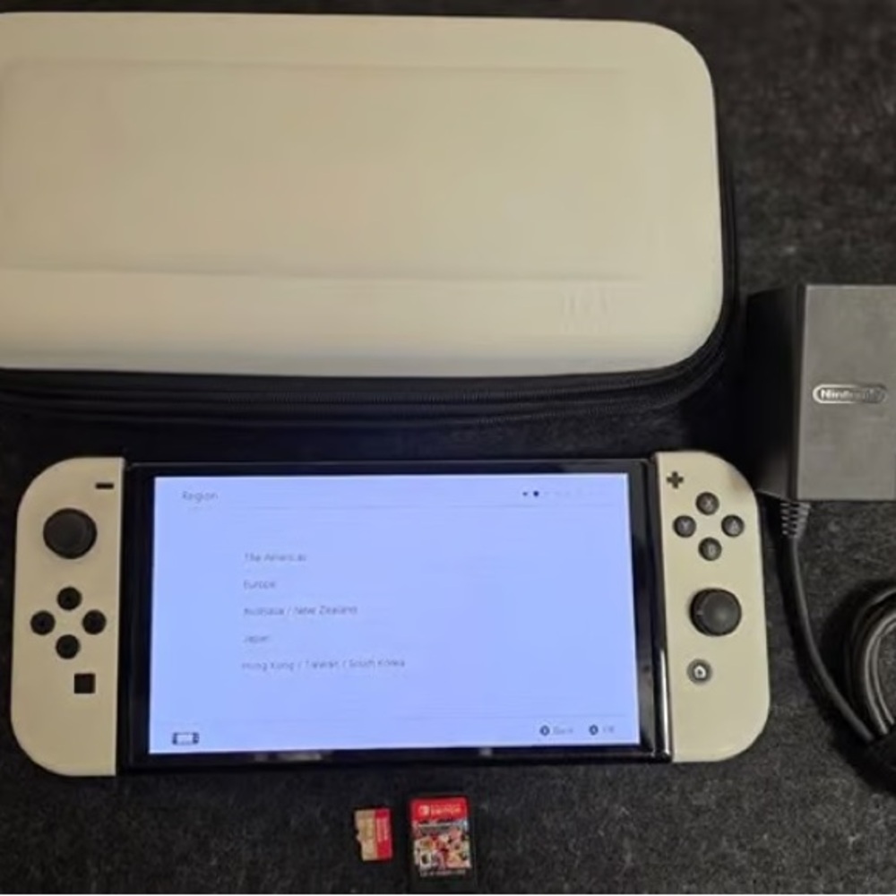 Nintendo Switch OLED White Joy-Con Bundle with Game Cards